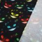 Preview: Fabric cotton jersey Ghost Cats Grinsekataze design black red turquoise yellow green children's fabric dress fabric