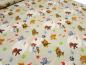 Preview: Stoff Baumwolle Jersey mit Lizenzdruck Paw Patrol beige-braun bunt Kinderstoff Kleiderstoff Lizenzstoff