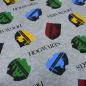 Preview: Fabric cotton French Terry Harry Potter Hogwarts crest design gray melange blue green red yellow black licensed fabric children's fabric dress fabric