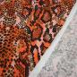 Preview: Stoff Viskose Jersey mit Schlangen Tierprint Design orange rosa schwarz braun bunt Kleiderstoff