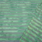 Preview: Fabric cotton jersey with 9 mm batik stripe design gray green striped dress fabric children's fabric