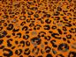 Preview: Stoff Sweatshirtstoff innen weich angerauht mit Tierfellmuster Leopard/Jaguar Design orange grau schwarz Kleiderstoffe Kinderstoffe Hoodiestoffe