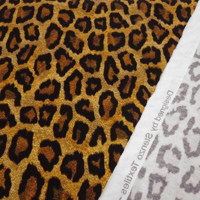 Stoff Baumwolle Jersey Leo Print Tierprint braun lehm curry schwarz Kleiderstoff