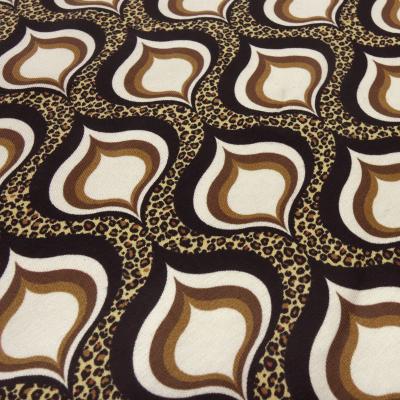 Stoff Baumwolle Jersey mit Leo Tierfellmuster Design Ornamente beige braun sand schwarz Kleiderstoff Kinderstoff