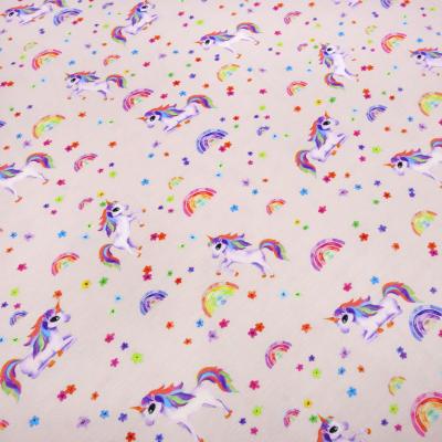 Stoff Baumwolle Jersey Einhörner Regenbogen Blüten zart rosa bunt Kinderstoff Kleiderstoff