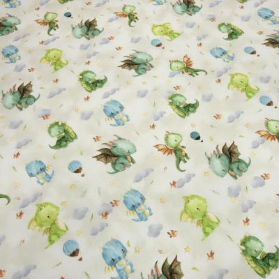 Stoff Baumwolle French Terry Sweatshirtstoff Sommersweat süße Drachen beige grün blau bunt Kleiderstoff Kinderstoff