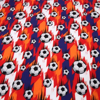 Stoff Baumwolle Jersey Fußball Soccer Bälle Design blau rot orange weiß schwarz Kinderstoff Kleiderstoff