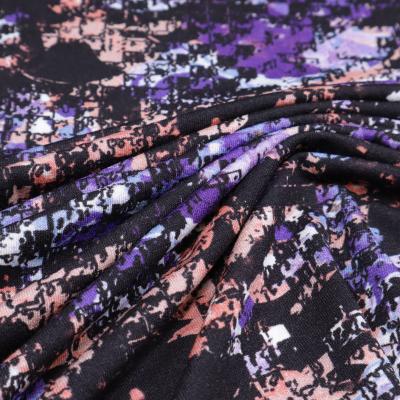 Fabric viscose jersey with abstract design purple black salmon blue white dress fabric