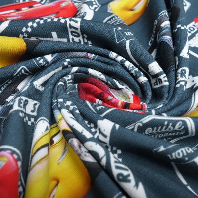 Cotton jersey fabric with Disney Cars Lightning McQueen River Scott design, gray, red, yellow, white, colorful, clothing fabric, children's fabric, licensed fabric