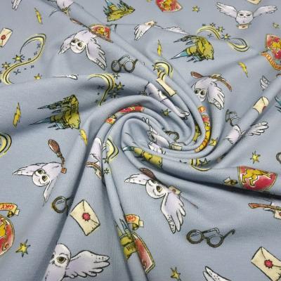 Fabric cotton jersey license print Harry Potter Hedwig owl grey blue red grey colorful children's fabric dress fabric