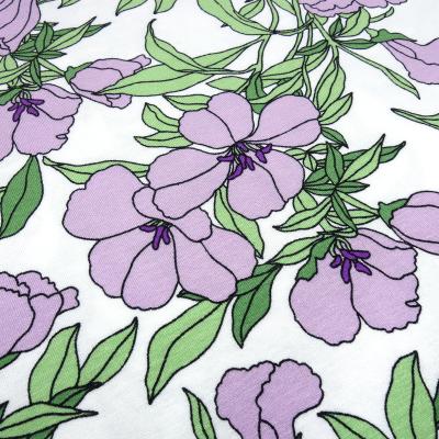 Fabric viscose jersey with floral pattern tendrils blossom design white lilac green dress fabric children's fabric