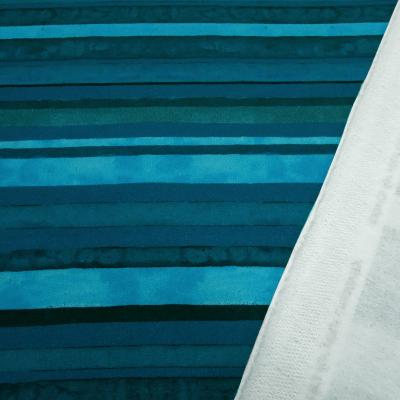 Fabric cotton sweatshirt fabric with striped design in teal, blue, and turquoise children's clothing fabric