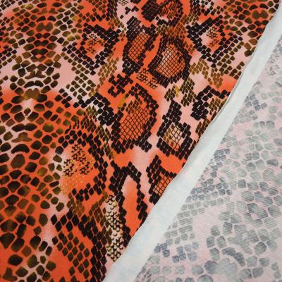 Stoff Viskose Jersey mit Schlangen Tierprint Design orange rosa schwarz braun bunt Kleiderstoff