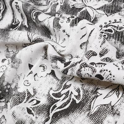 Stoff Blusenstoff mit abstrakten Blumenmuster Design weiß schwarz mit Pailletten Kleiderstoff