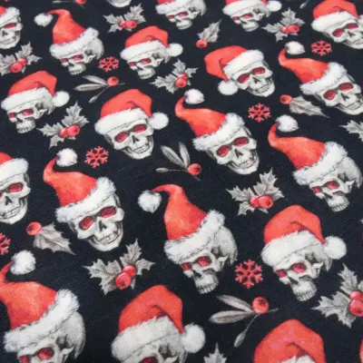 Stoff Baumwolle Popeline mit Xmas Weihnachts Totenköpfe Skulls mit Weihnachtsmützen Design schwarz rot weiß Kleiderstoff Blusenstoff Dekostoff