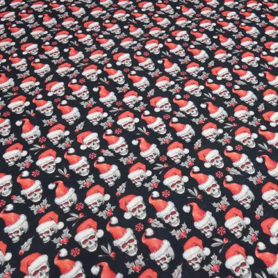 Stoff Baumwolle Popeline mit Xmas Weihnachts Totenköpfe Skulls mit Weihnachtsmützen Design schwarz rot weiß Kleiderstoff Blusenstoff Dekostoff