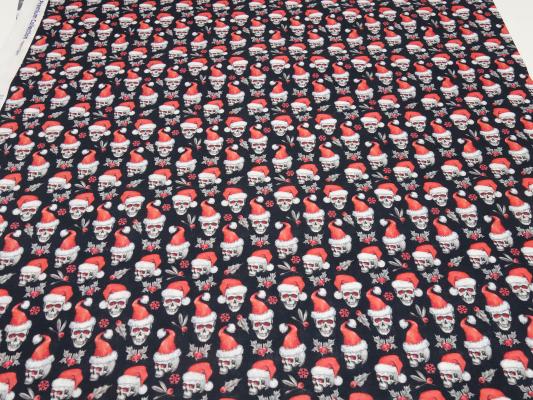 Stoff Baumwolle Popeline mit Xmas Weihnachts Totenköpfe Skulls mit Weihnachtsmützen Design schwarz rot weiß Kleiderstoff Blusenstoff Dekostoff