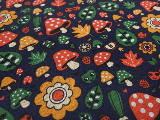 Fabric sweatshirt fabric with alpine fleece off side with mushrooms toadstool flowers design blue red green orange colorful children's fabric clothing fabric hoodie fabric