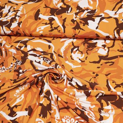 Fabric viscose slinky jersey abstract floral design orange terracotta brown white dress fabric