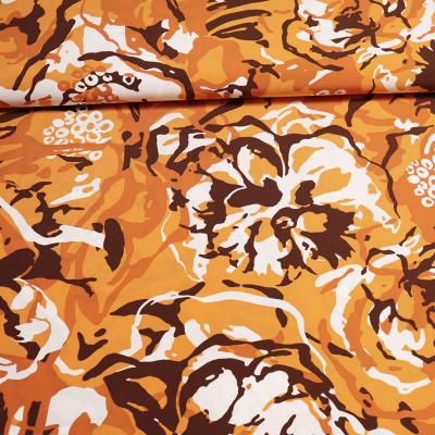 Fabric viscose slinky jersey abstract floral design orange terracotta brown white dress fabric