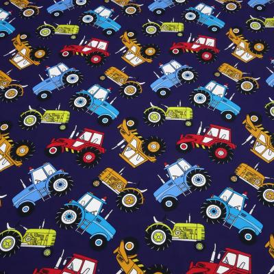 Stoff Baumwolle Jersey Farmer Trecker Traktor Design dunkelblau bunt Kinderstoff Kleiderstoff