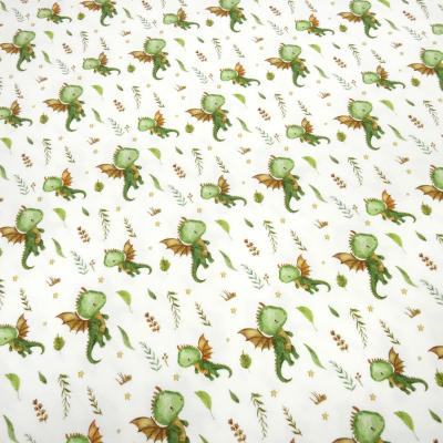 Stoff Baumwolle Jersey Little Dragon Drachen Design creme weiß grün braun bunt Kinderstoff Kleiderstoff