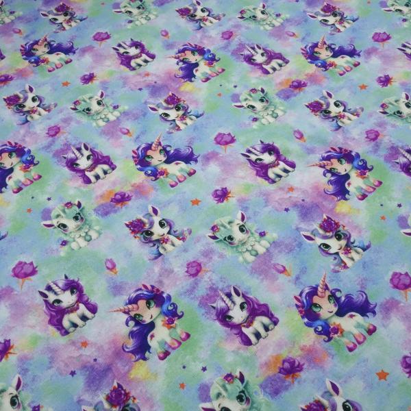 Stoff Sweatshirtstoff mit Alpenfleece Abseite Batik Einhorn Einhörner minze blau lila grün weiß orange bunt Kinderstoff Kleiderstoff