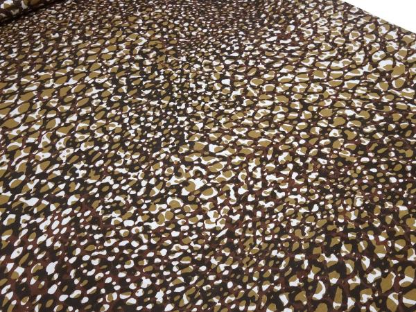 Fabric cotton jersey with animal fur motif leo design brown clay white black dress fabric