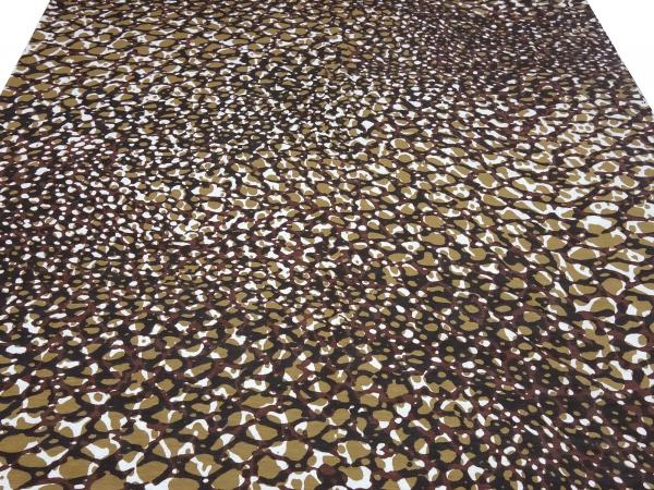Fabric cotton jersey with animal fur motif leo design brown clay white black dress fabric