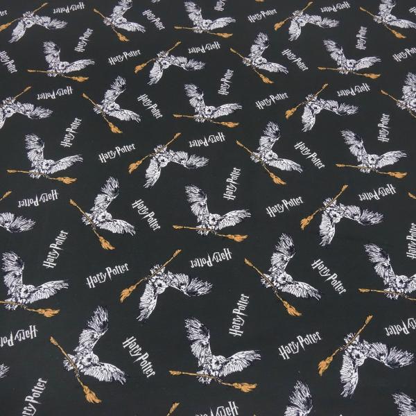 Stoff Baumwolle Jersey Lizenzdruck Harry Potter Eule Hedwig anthrazit braun weiß Kinderstoff Kleiderstoff
