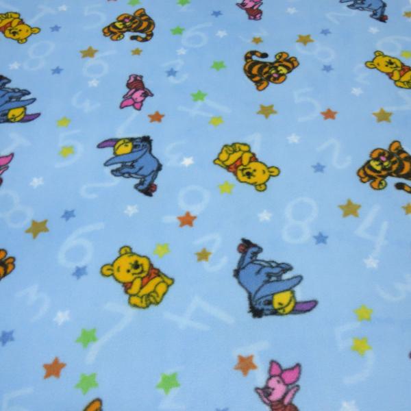 Stoff Microfleece Wellnessfleece Fleece mit Disney Winnie Pooh Design hellblau bunt Kinderstoff Kleiderstoff Lizenzstoff Dekostoff