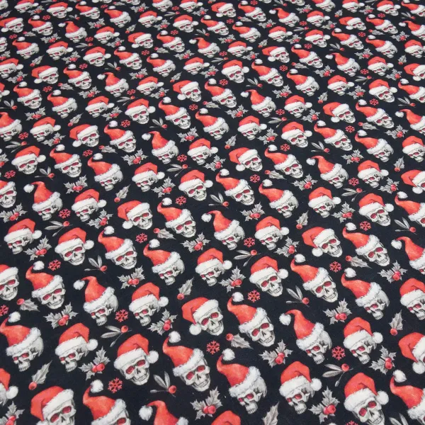 Stoff Baumwolle Popeline mit Xmas Weihnachts Totenköpfe Skulls mit Weihnachtsmützen Design schwarz rot weiß Kleiderstoff Blusenstoff Dekostoff