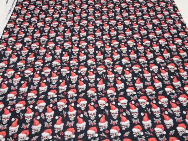 Stoff Baumwolle Popeline mit Xmas Weihnachts Totenköpfe Skulls mit Weihnachtsmützen Design schwarz rot weiß Kleiderstoff Blusenstoff Dekostoff