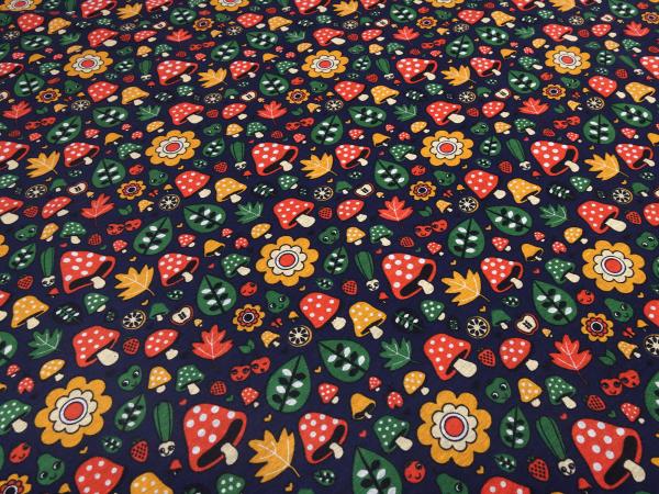 Fabric sweatshirt fabric with alpine fleece off side with mushrooms toadstool flowers design blue red green orange colorful children's fabric clothing fabric hoodie fabric