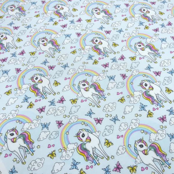 Stoff Baumwolle Jersey "dreaming unicorn" Einhorn Regenbogen Herzen hellblau bunt Kinderstoff Kleiderstoff