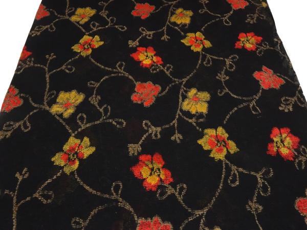 Stoff Ital. feiner leichter Baumwolle Jersey mit Intarsien Blumenmuster Ranken Design schwarz rot gelb-gold braun Kleiderstoff