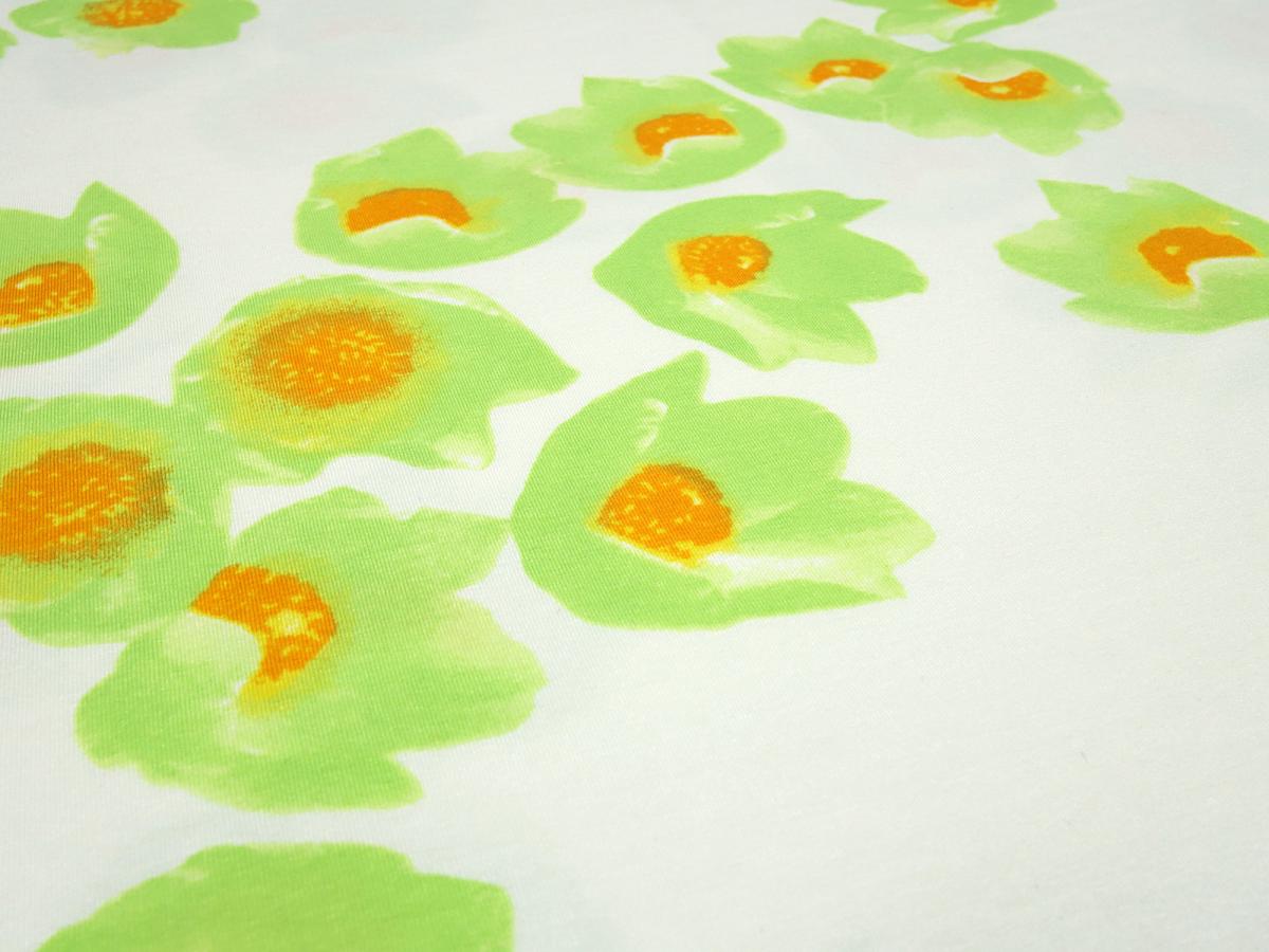 Fabric viscose jersey with flowers blossoms design offwhite green orange dress fabric