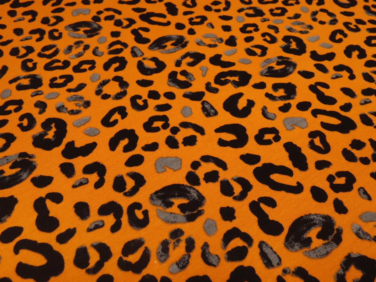 Stoff Sweatshirtstoff innen weich angerauht mit Tierfellmuster Leopard/Jaguar Design orange grau schwarz Kleiderstoffe Kinderstoffe Hoodiestoffe