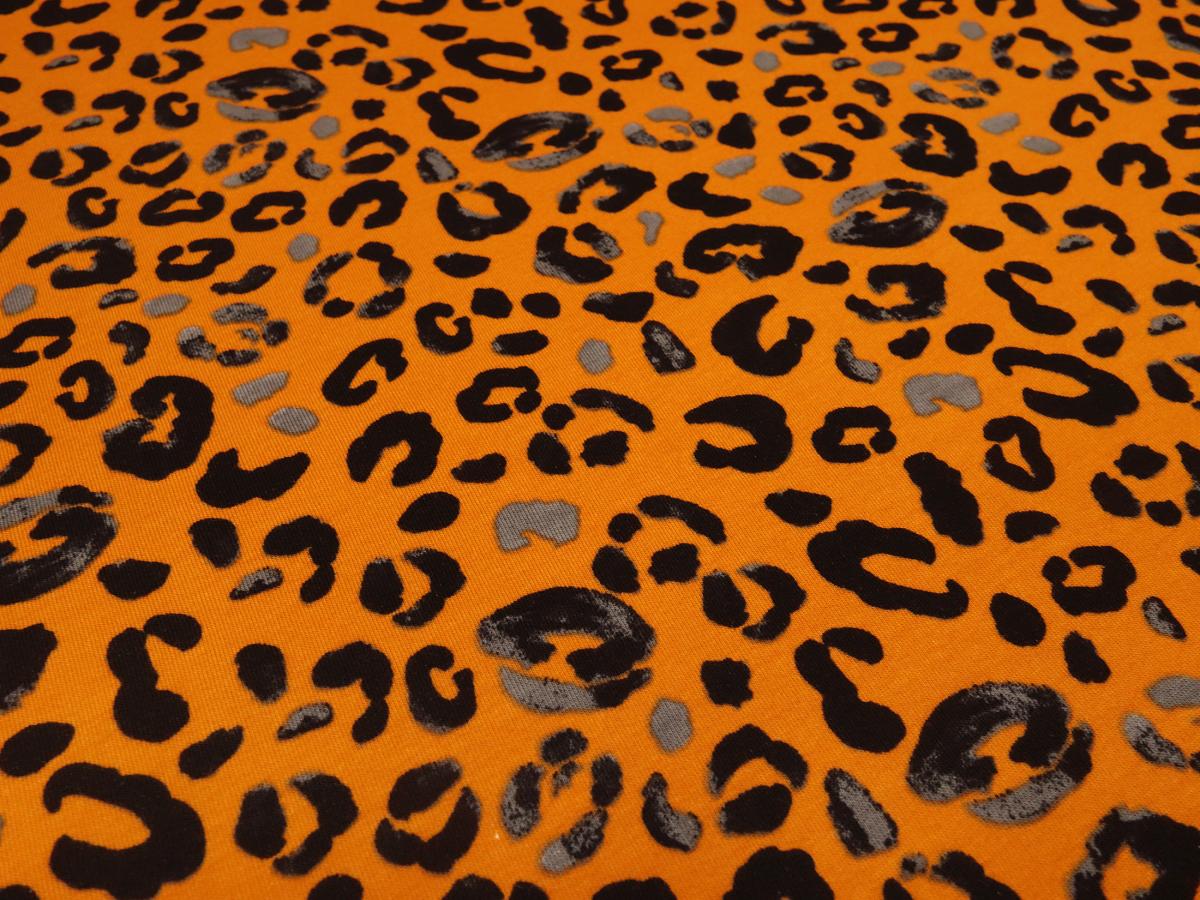 Stoff Sweatshirtstoff innen weich angerauht mit Tierfellmuster Leopard/Jaguar Design orange grau schwarz Kleiderstoffe Kinderstoffe Hoodiestoffe