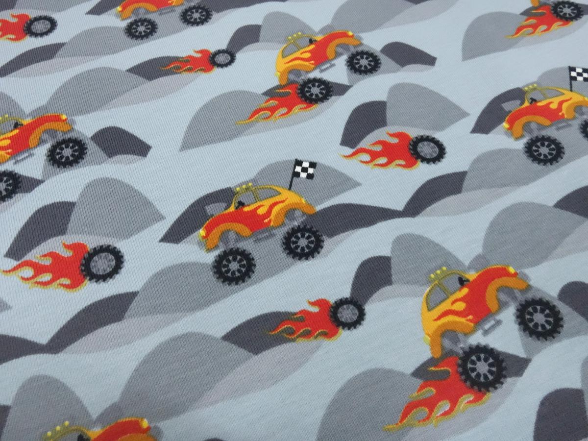 Fabric cotton jersey with monster trucks rally beetle car design gray black red orange colorful children's fabric dress fabric