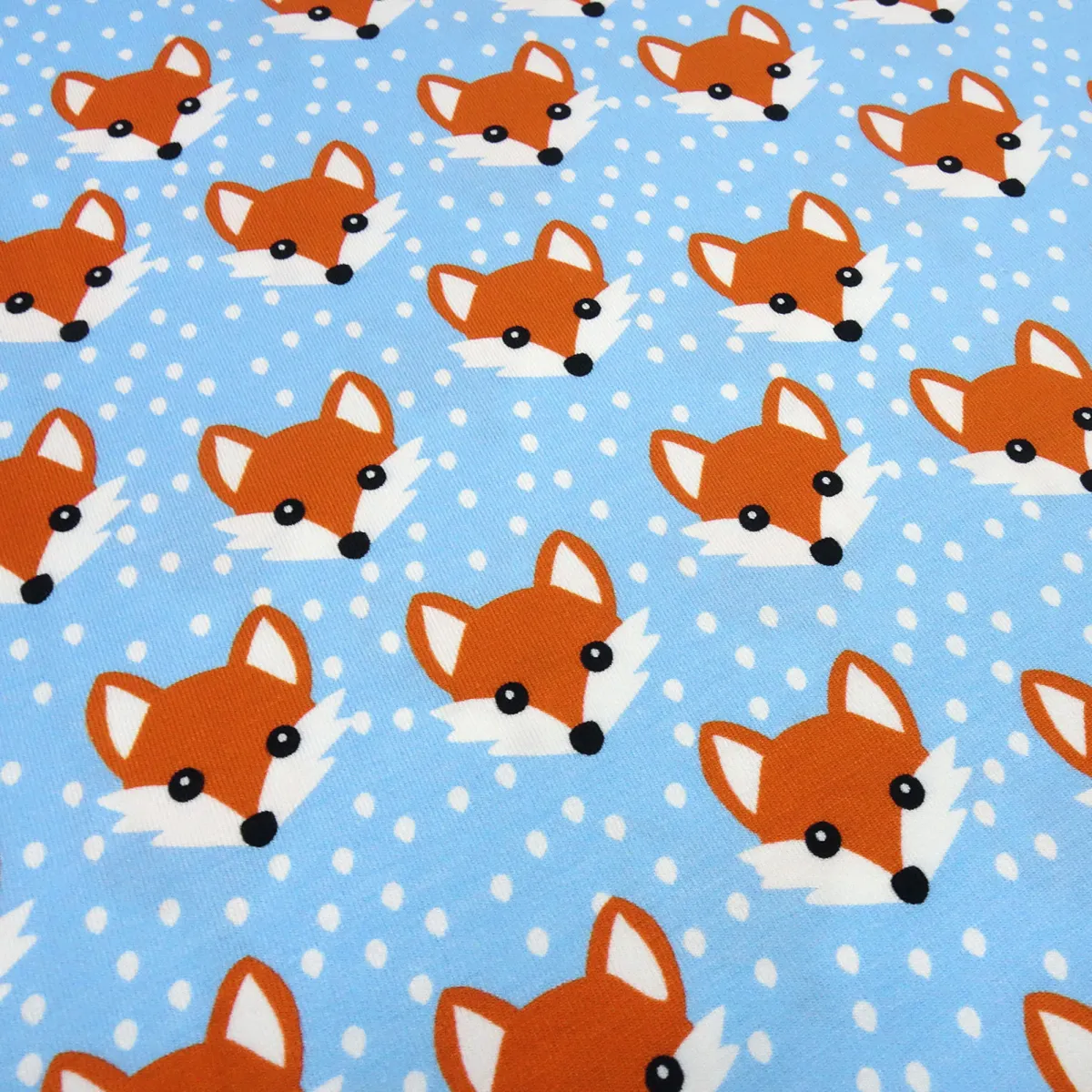 Stoff Baumwolle Jersey mit Füchse Fuchs-Kopf Design blau weiß orange Kinderstoff Kleiderstoff