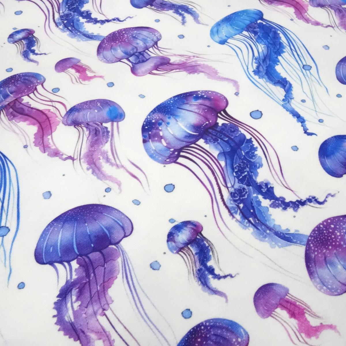 Cotton jersey fabric with jellyfish design in white blue purple and lilac dress fabric children's fabric