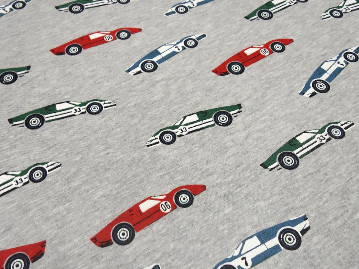 Fabric sweatshirt fabric with alpine fleece off side with racing car racing car design light gray melange red green blue colorful children's fabric dress fabric hoodie fabric